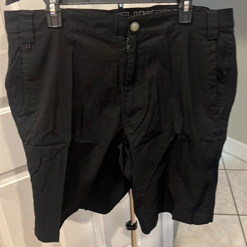 Reel Legends flat front, Dri fit fishing shorts. Size 42